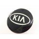 Наклейки Kia D56 мм алюминий (Серебристый логотип на черном фоне)