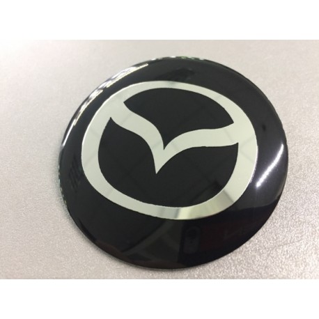 Наклейки Mazda D56 мм алюминий (Серебристый логотип на черном фоне)